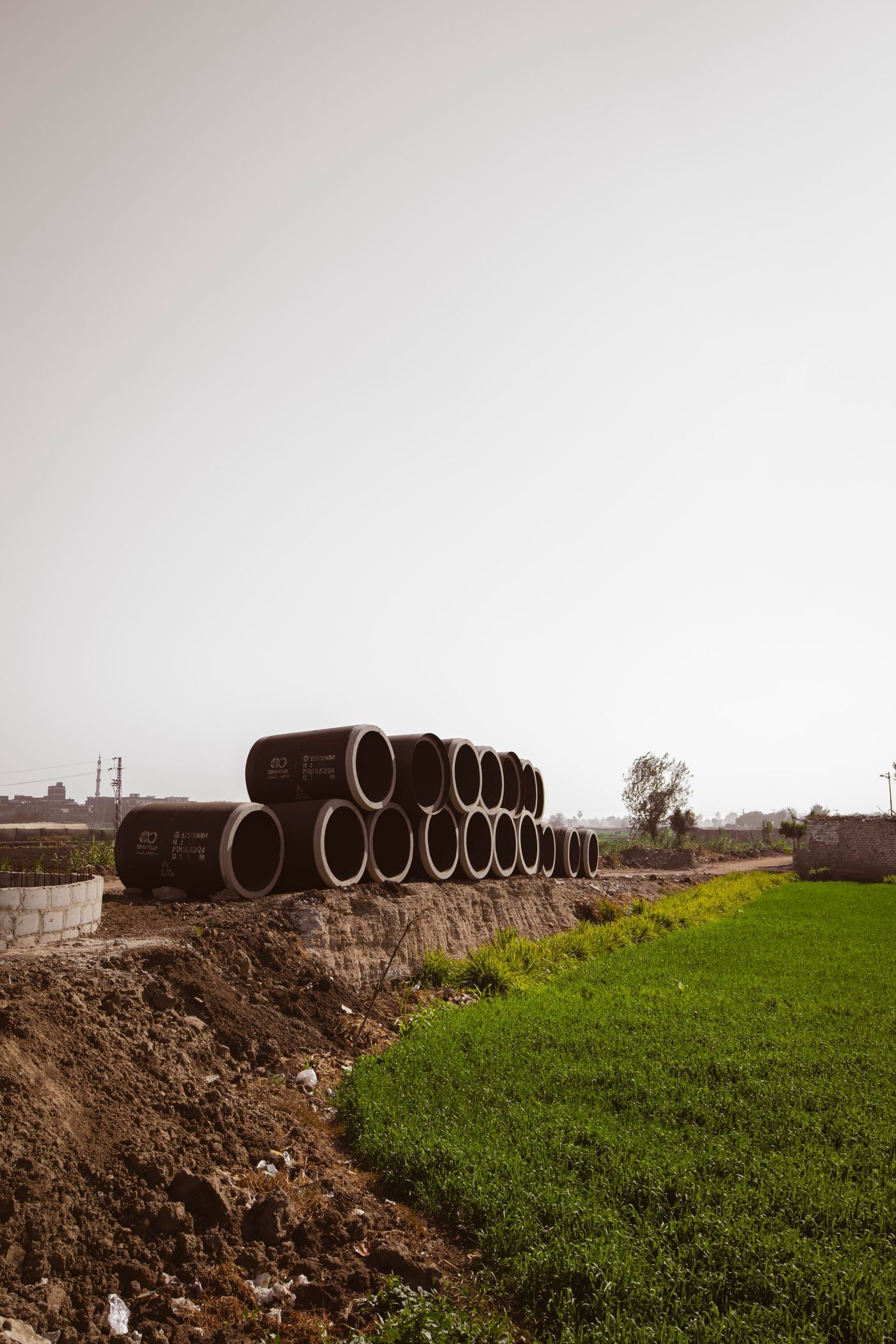 Reinforced concrete pipes stacked at a supplier yard