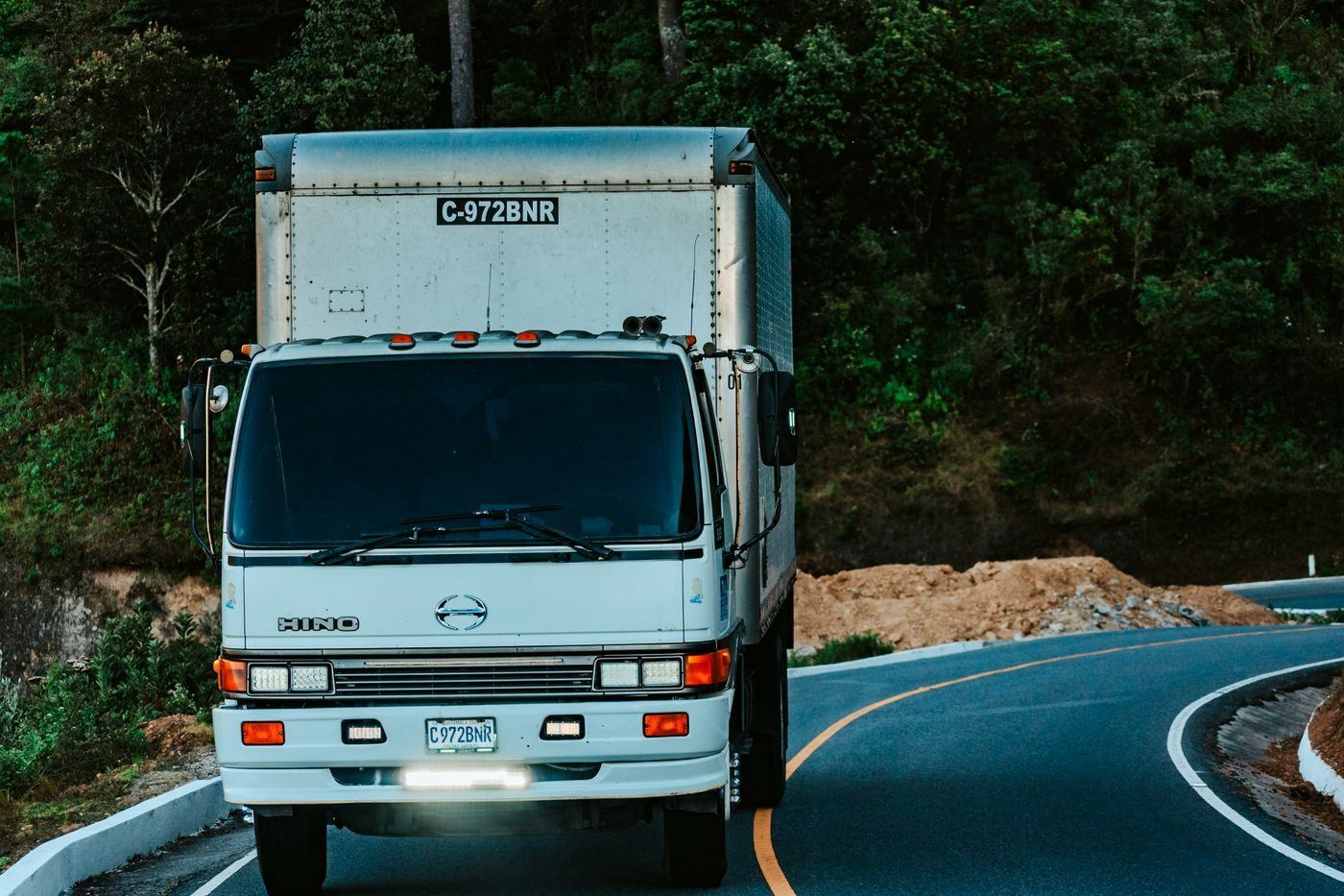 Box lorry on the road making a building materials delivery